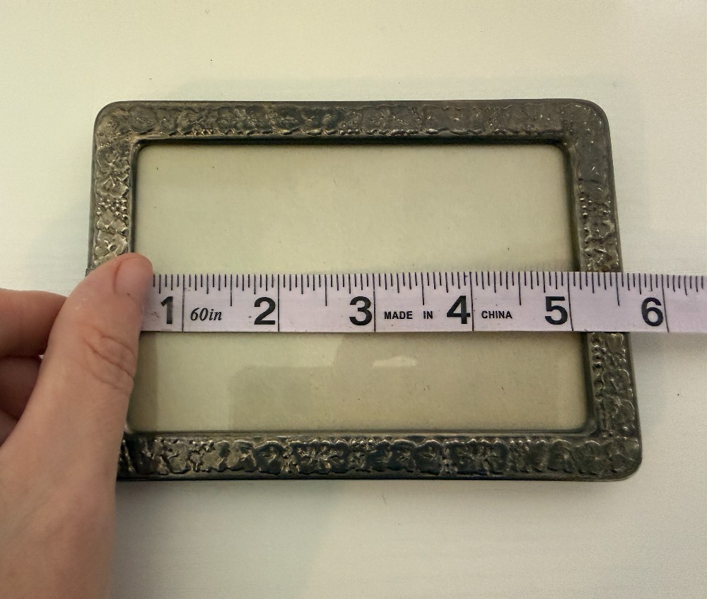 Silver tone frame