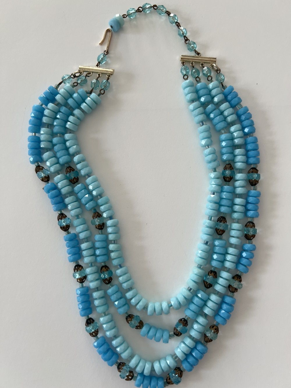 Vtg Four Strand Turquoise-colored beaded necklace