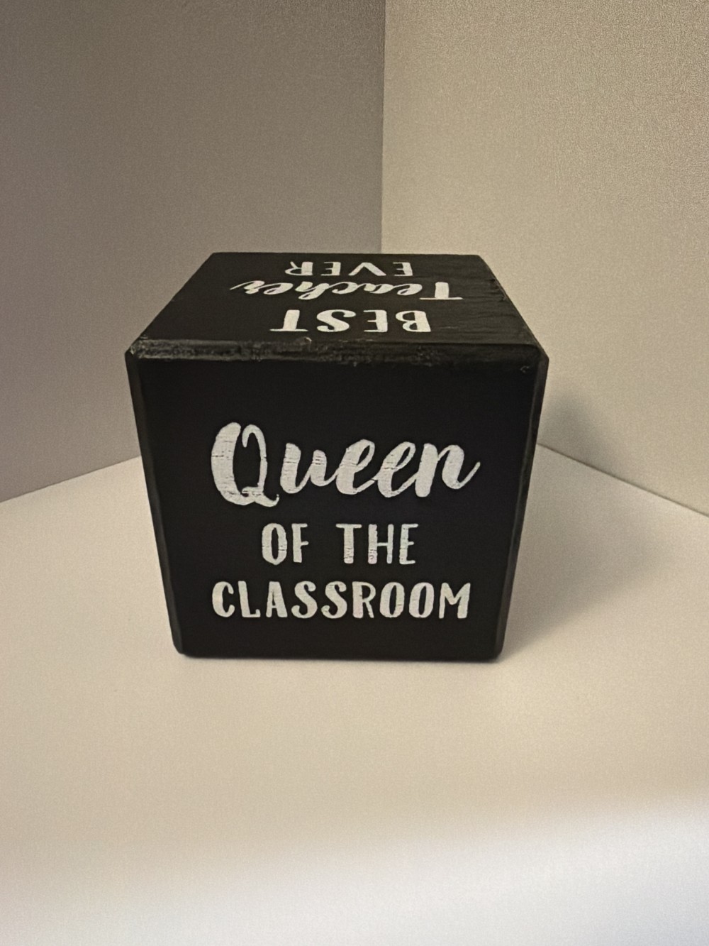 Teacher black wooden cube
