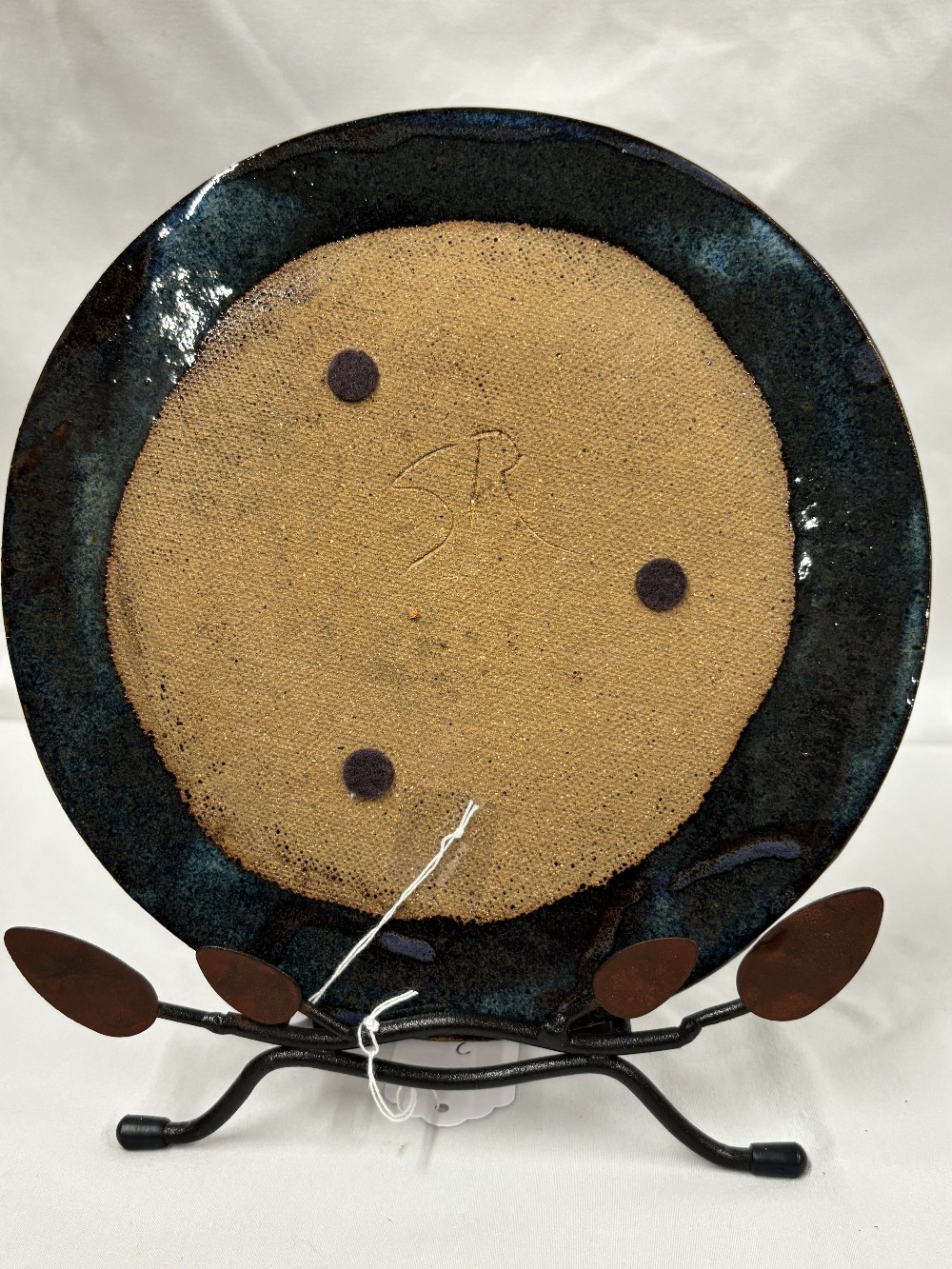 Decor pottery plate tans, blues, gray and rust w/metal holder w/brown leaves