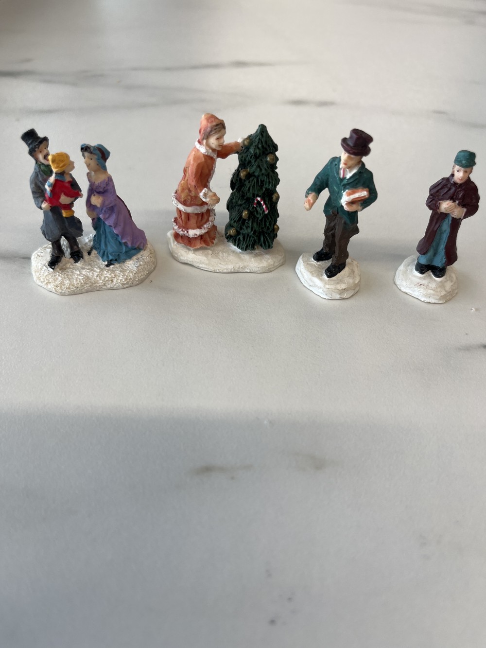Set of 4 Christmas Village figurines