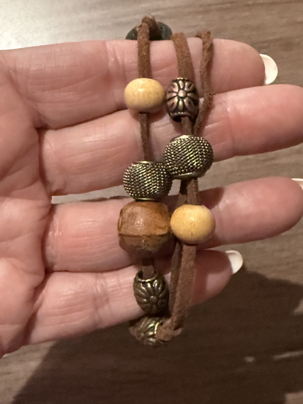 Bracelet - Bronze skull brown leather bead accents