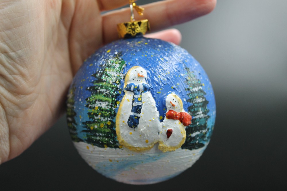 Handpainted snowmen/winter scene ornament