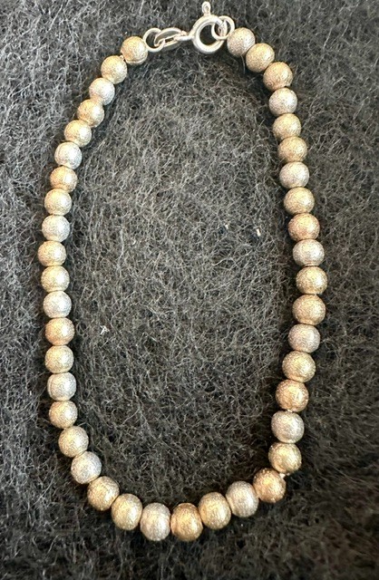 925 Sterling Beaded Bracelet. 7.25 in. Gold wash on some beads.