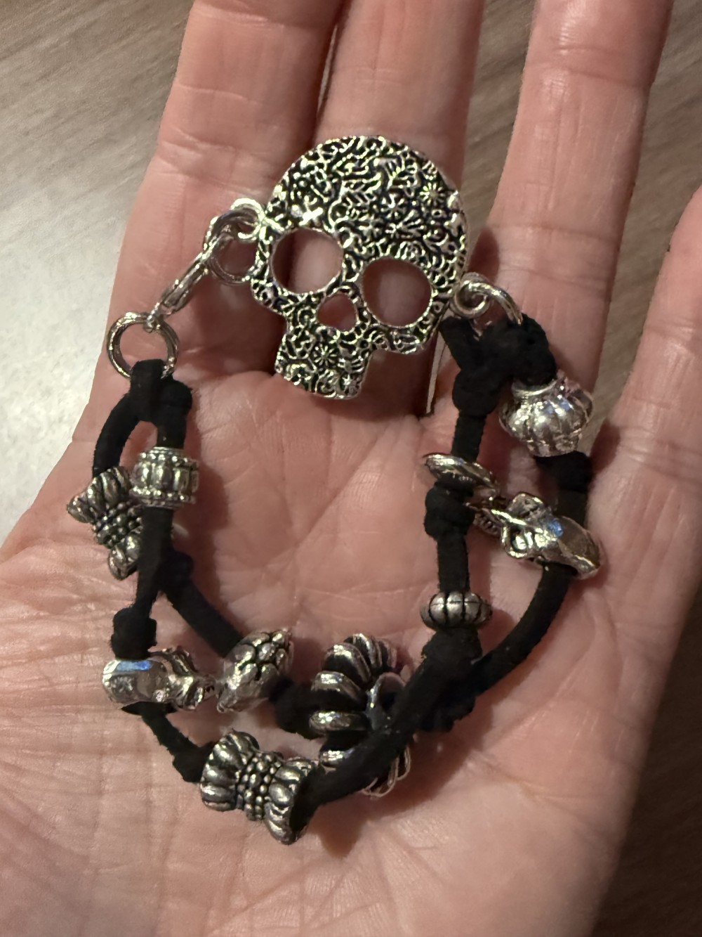 Bracelet - Silver skull Black leather bead accents