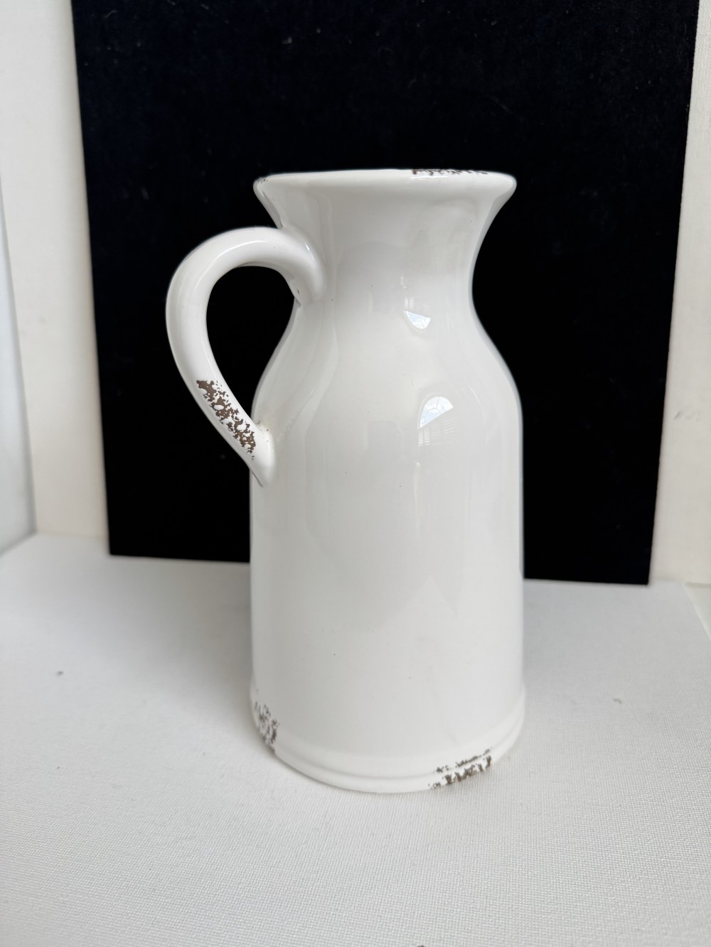 PITCHER, POTTERY CREAMER WITH DESIGNS