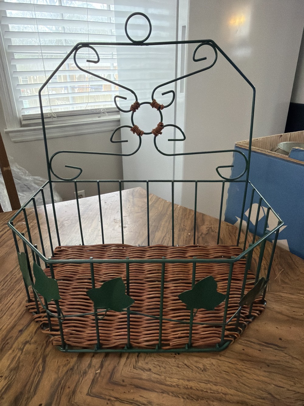 Green metal & brown wicker basket