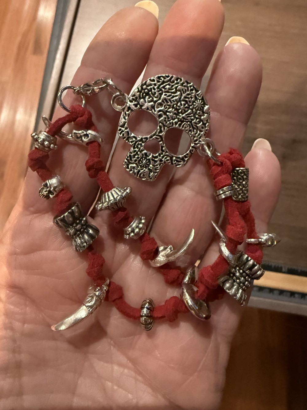 Bracelet - Silver skull Red leather bead accents