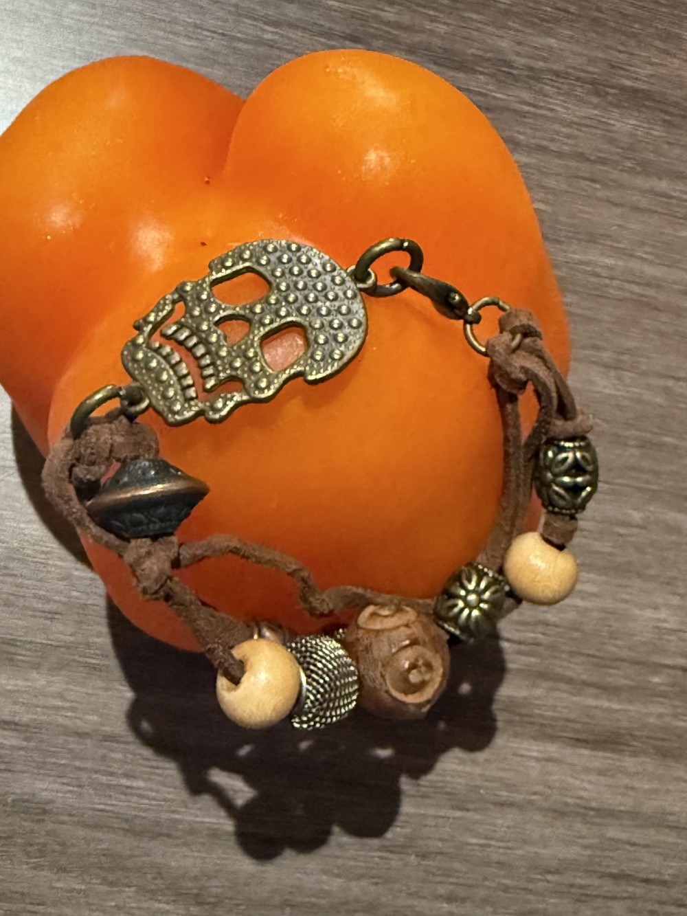 Bracelet - Bronze skull brown leather bead accents