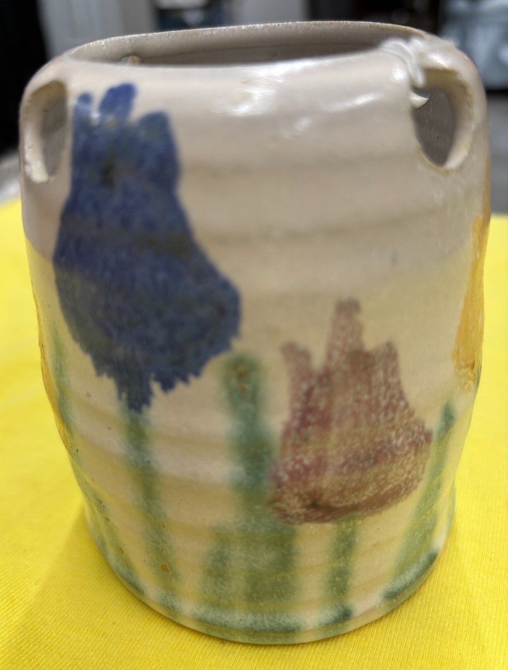Pottery handcrafted off white w/purple blue & yellow tulips