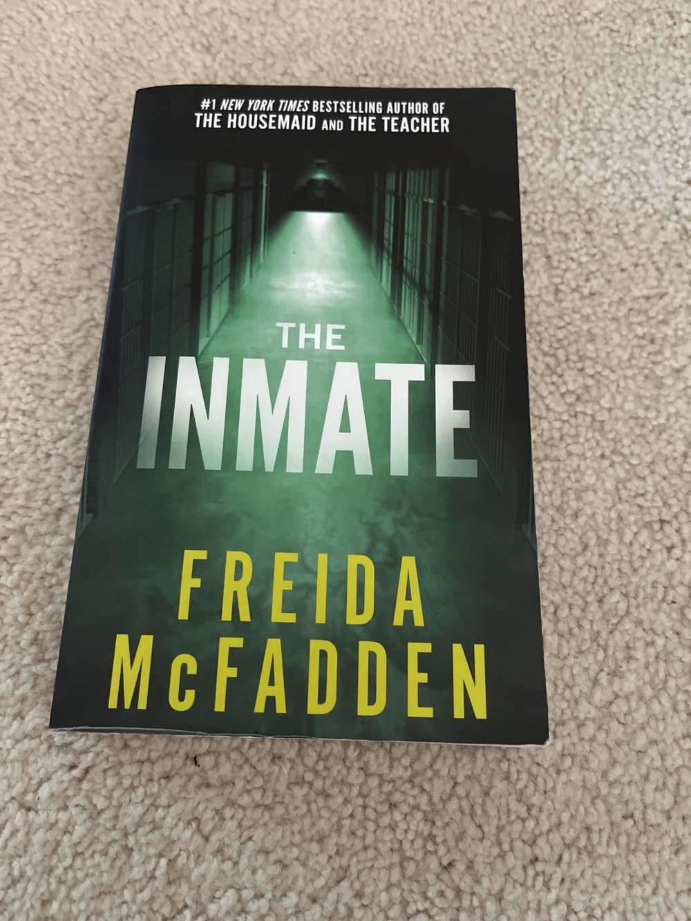 Paperback book “The Inmate” by Freida McFadden
