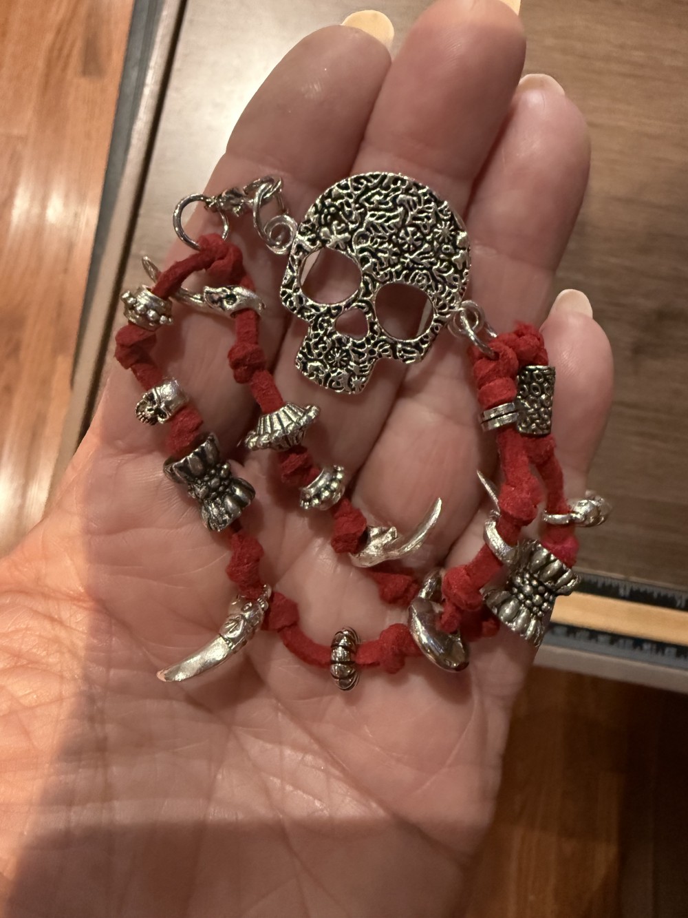 Bracelet - Silver skull Red leather bead accents