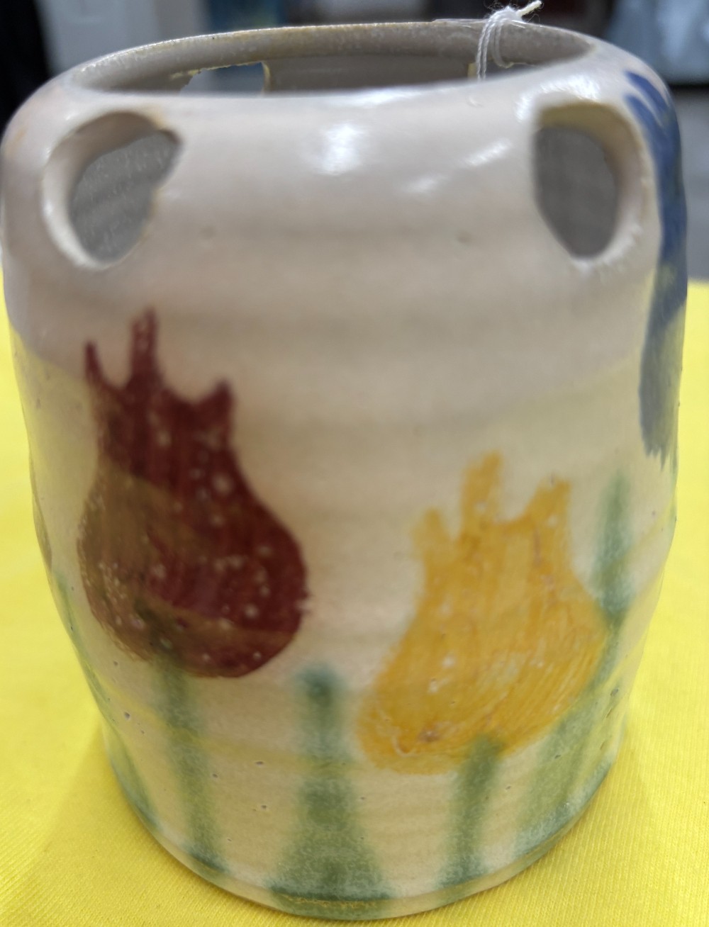 Pottery handcrafted off white w/purple blue & yellow tulips