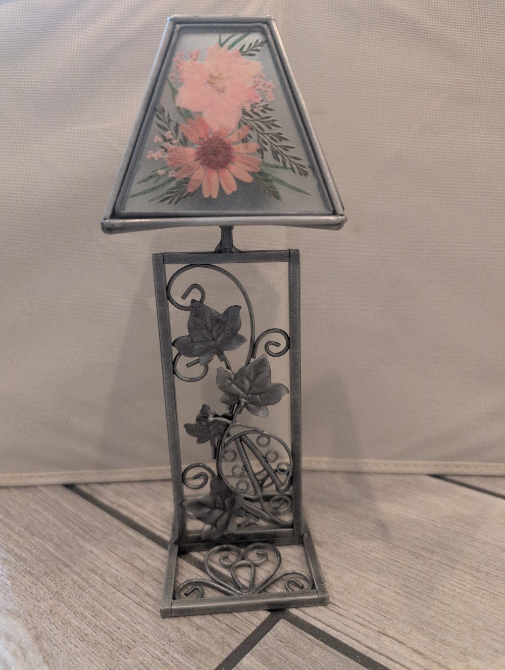 Metal and glass pressed flower tealight holder