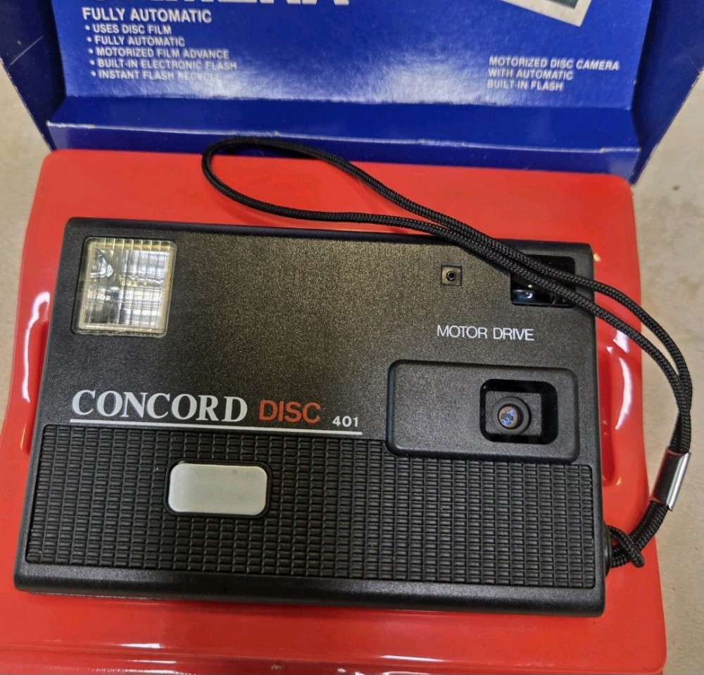 VTG 1980s Concord 401 Disc Camera Untested With Box & Manual. Untested.