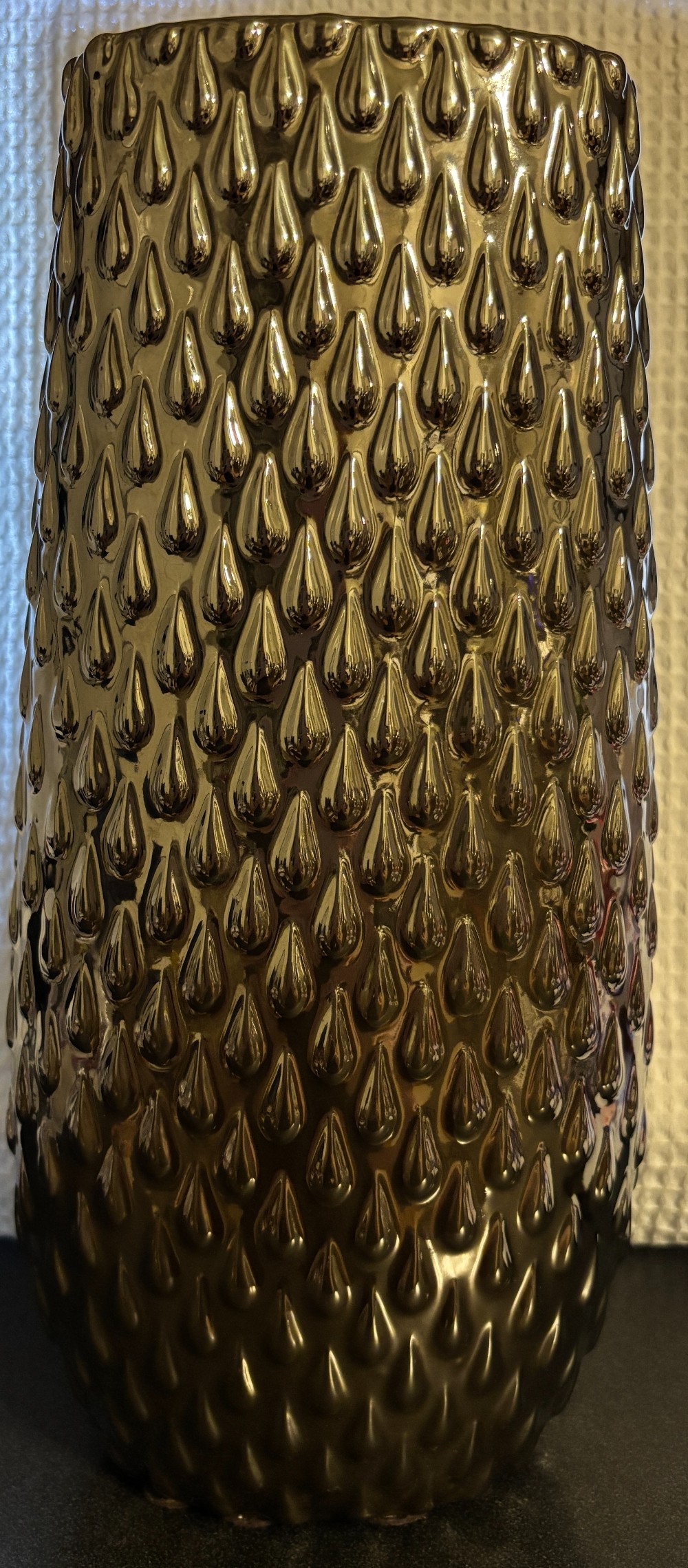 Tall oval pewter embossed ceramic container