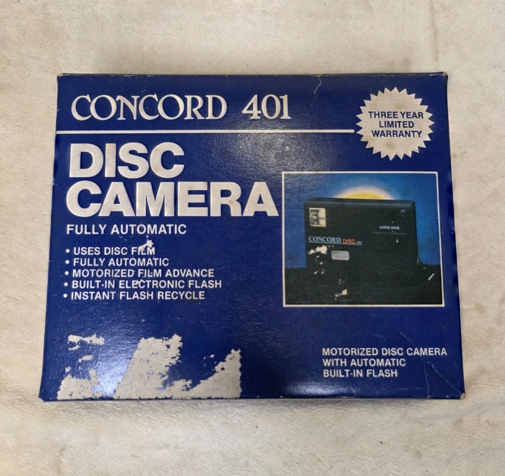 VTG 1980s Concord 401 Disc Camera Untested With Box & Manual. Untested.