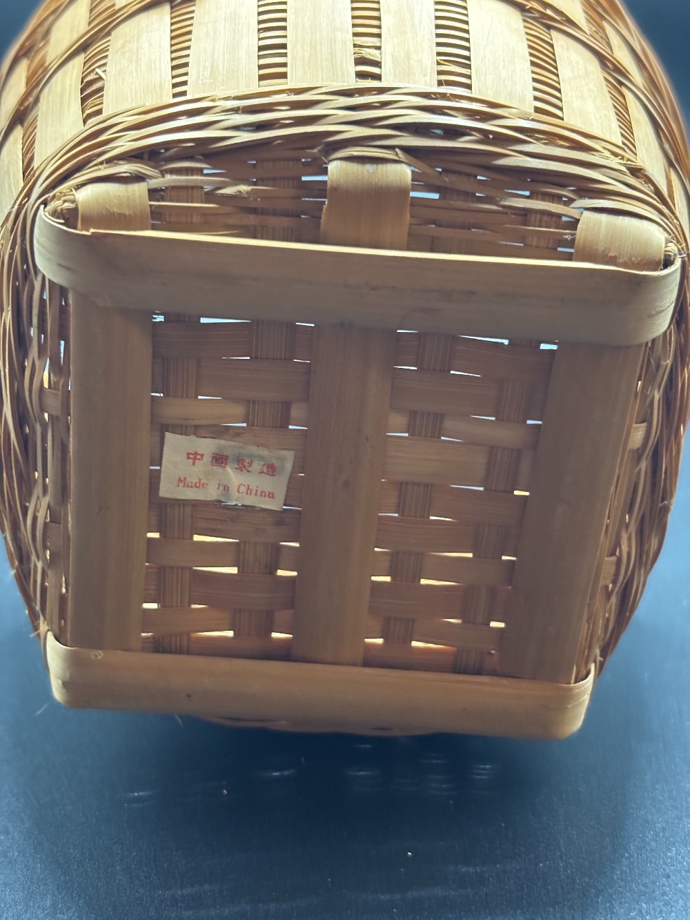 Basket handwoven bamboo round w/square base vintage 70's
