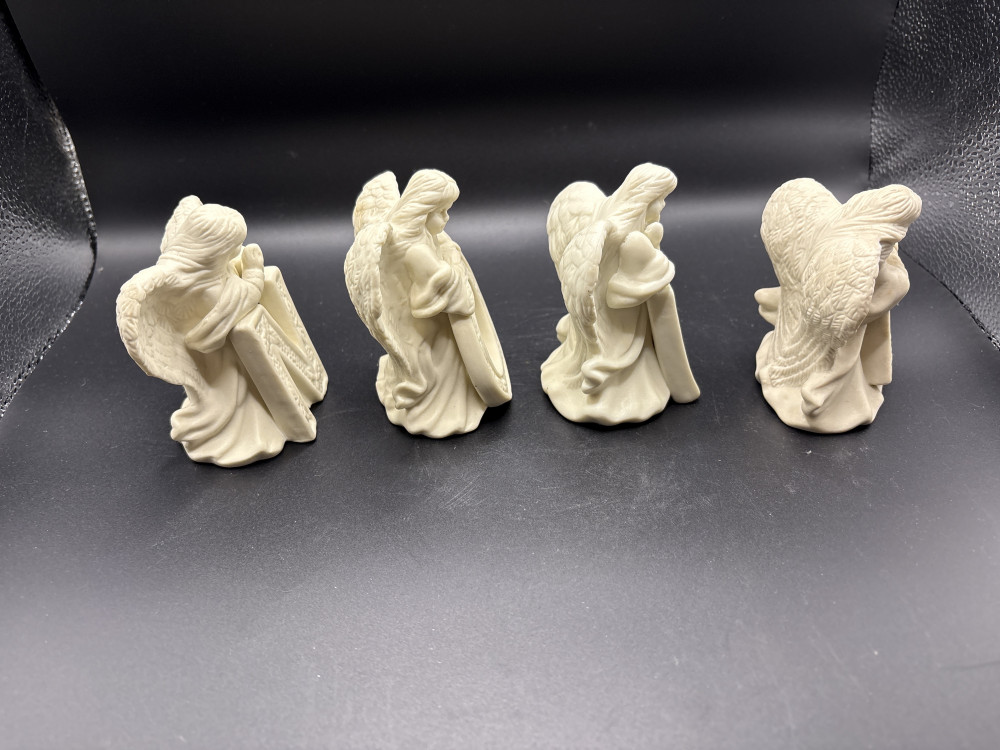 4 pc NOEL Christmas Figurines Pre-owned