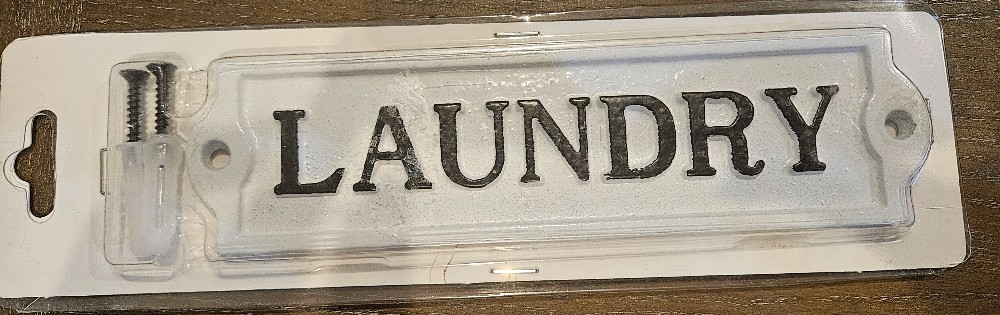 Cast iron laundry sign