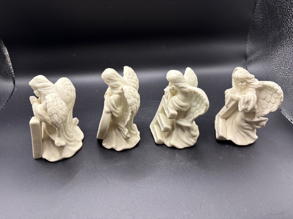 4 pc NOEL Christmas Figurines Pre-owned