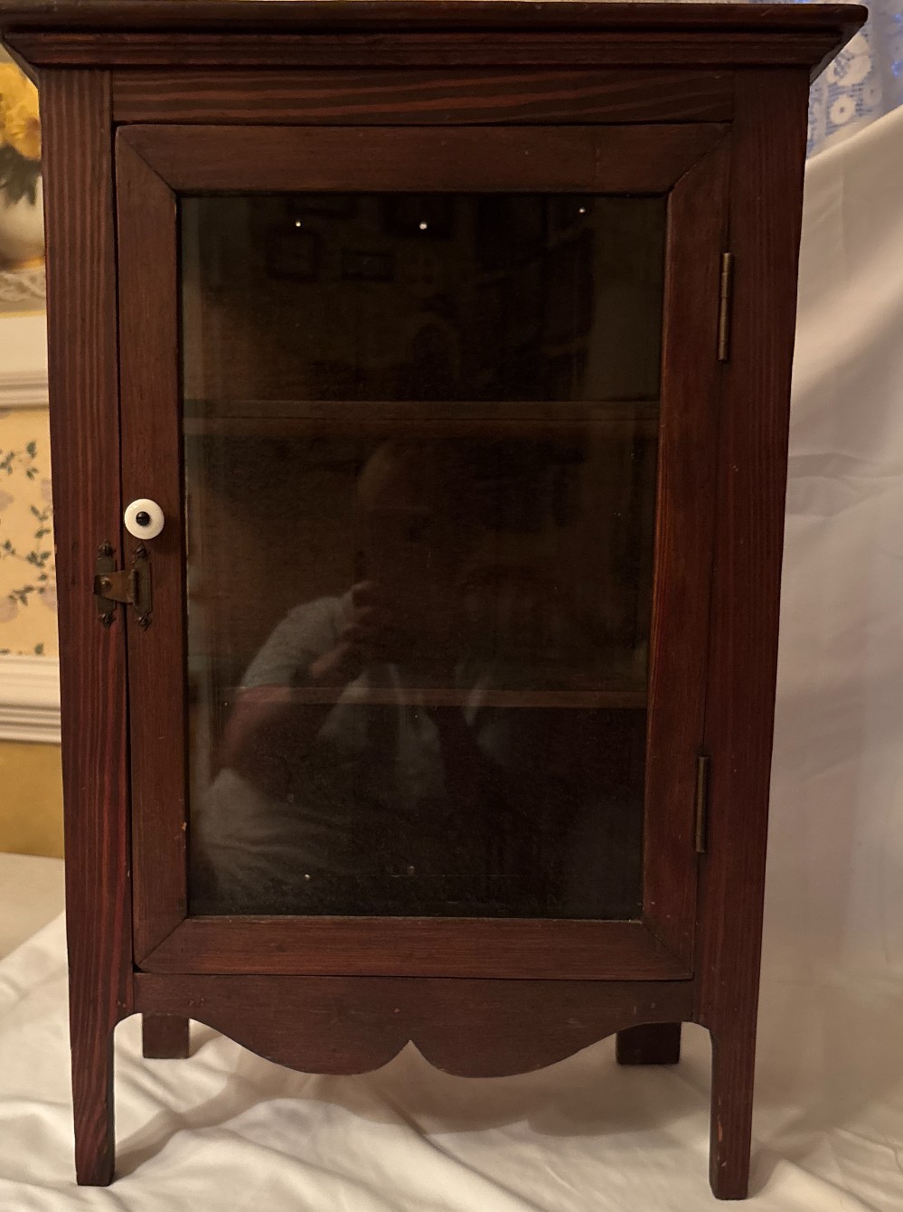 Antique dark wood curio cabinet w/white glass knob