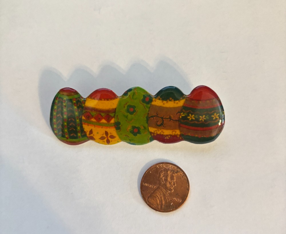 Easter eggs multi color pin plastic w/vinyl topping