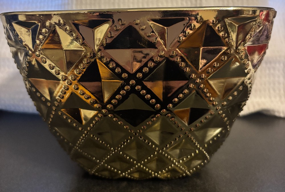 Decorative bowl embossed quilted design gold/silver glass
