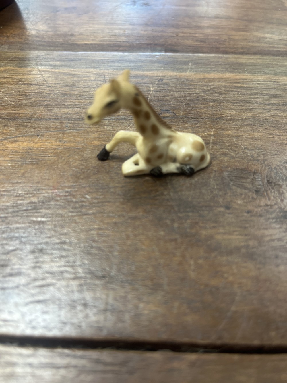 Baby giraffe figurine