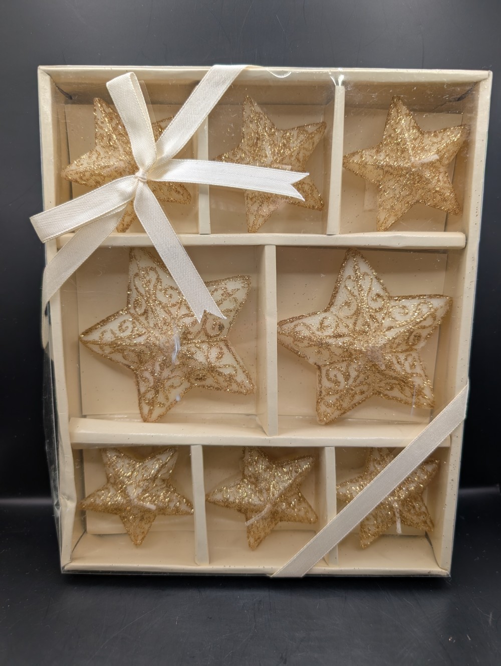 White/gold star candles in box