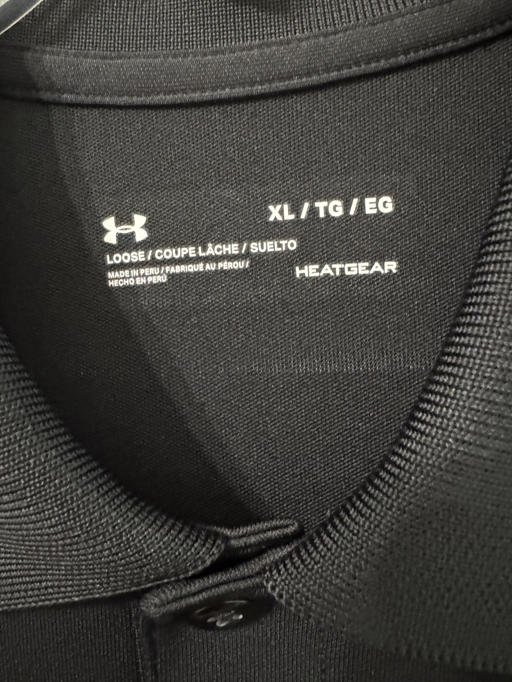 UNDER ARMOUR, BLACK S/S POLO