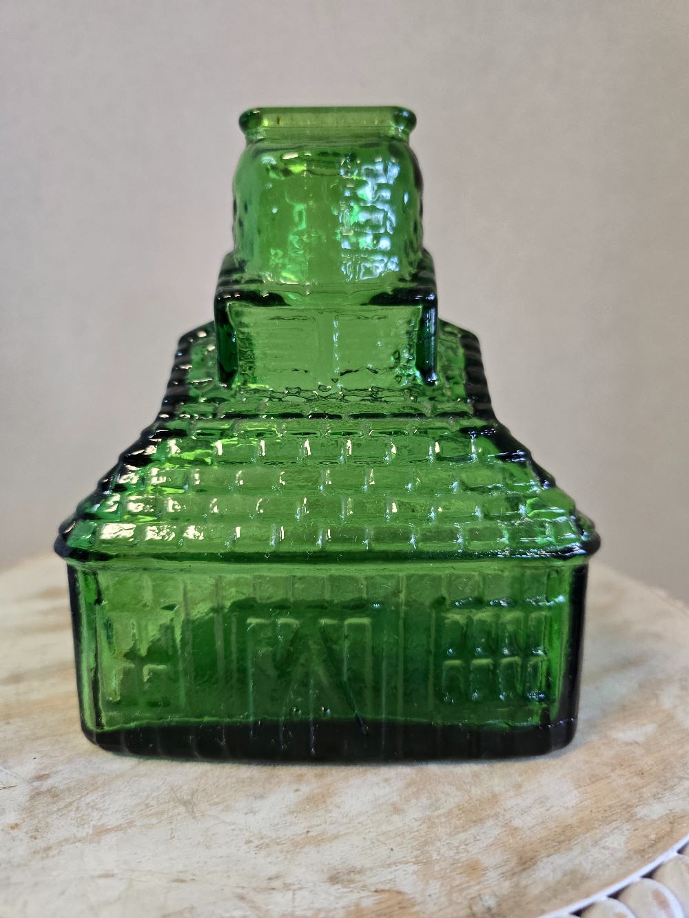 Cabin shaped glass bank