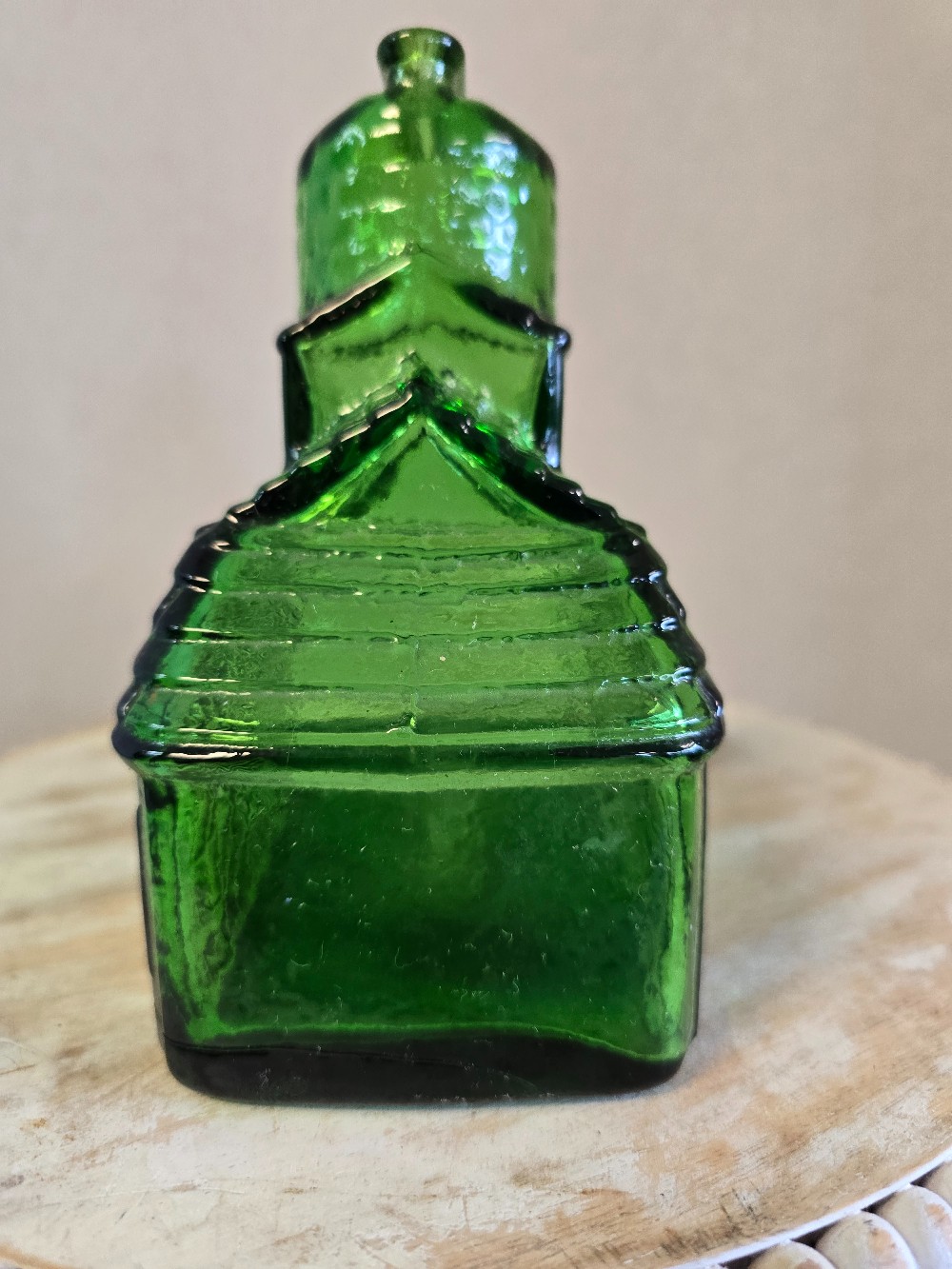 Cabin shaped glass bank