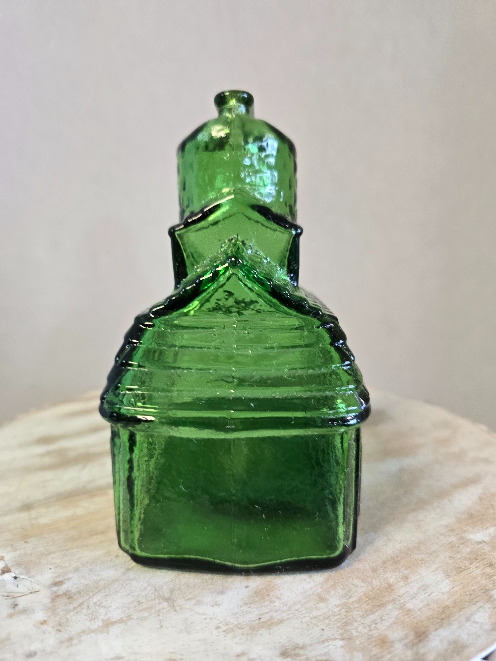 Cabin shaped glass bank
