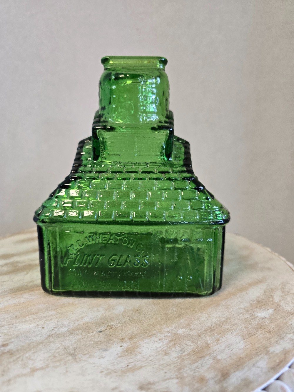 Cabin shaped glass bank