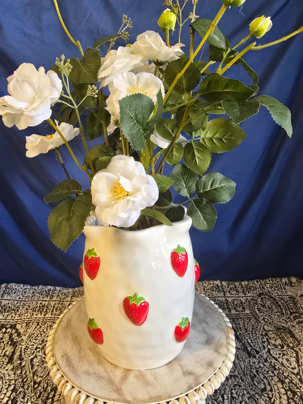 Ceramic  strawberry planter with greenery/flowers
