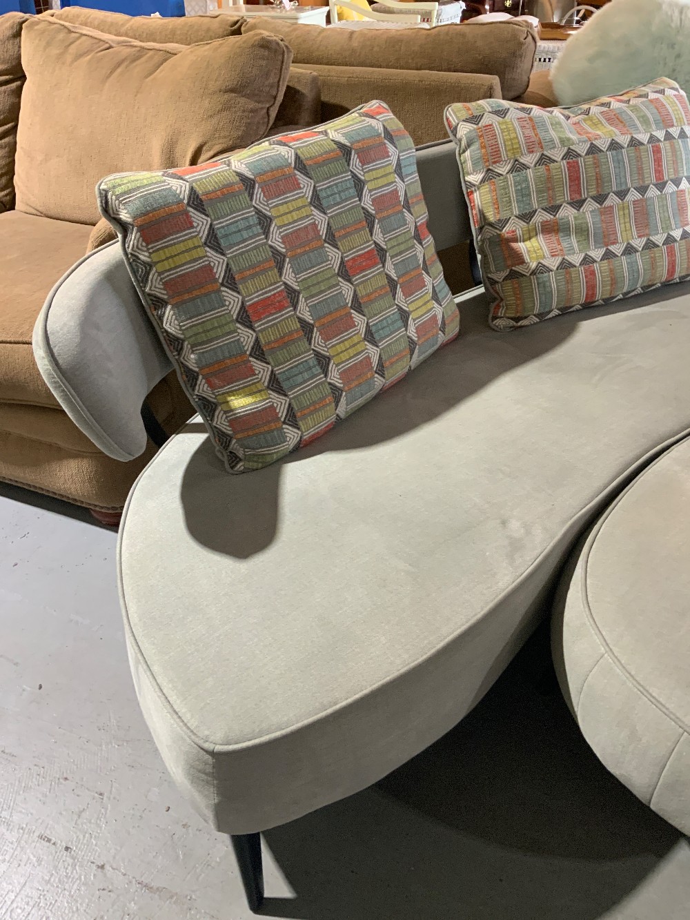 Grey Couch With 2 Pillows and Ottoman