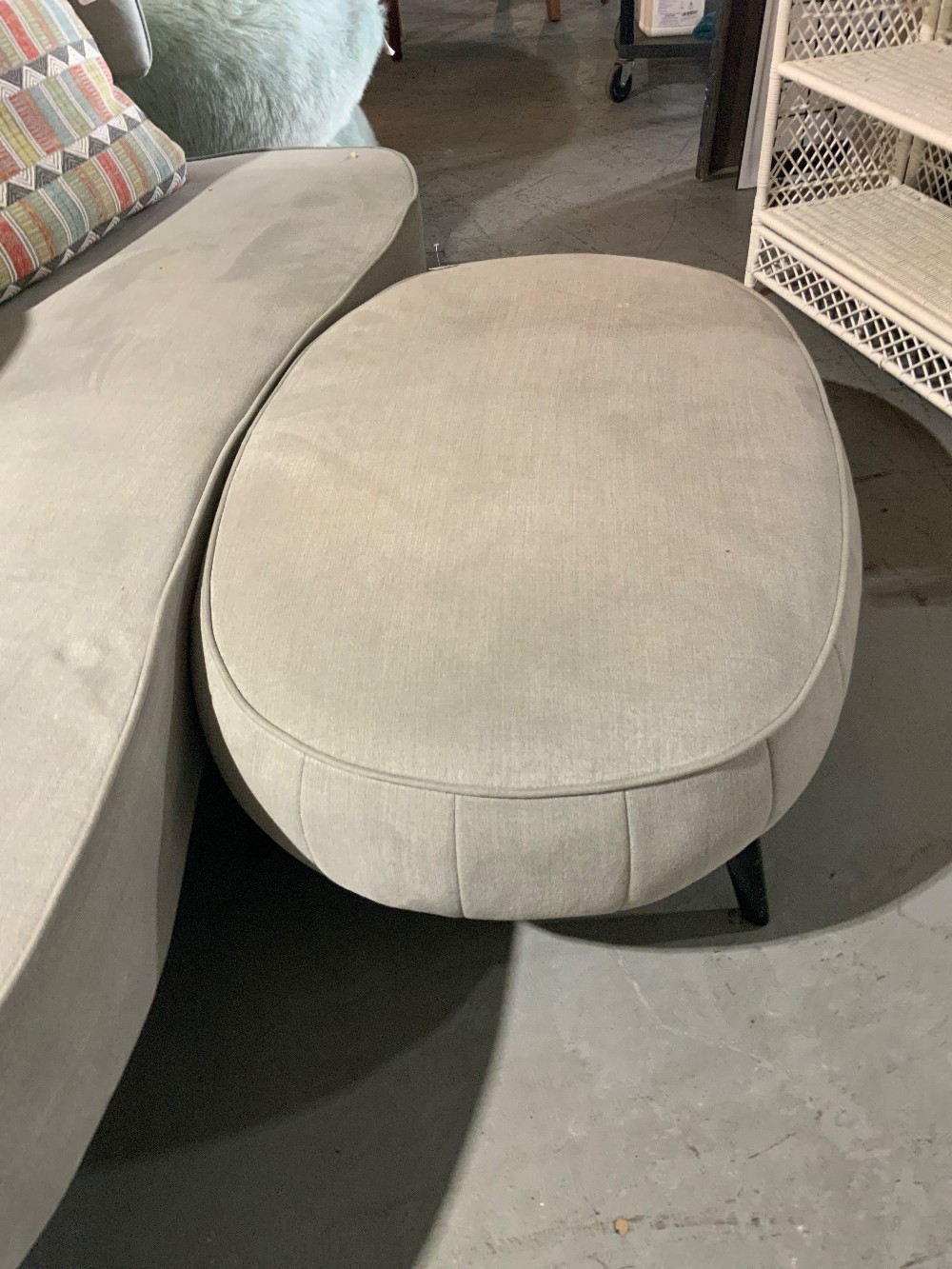 Grey Couch With 2 Pillows and Ottoman