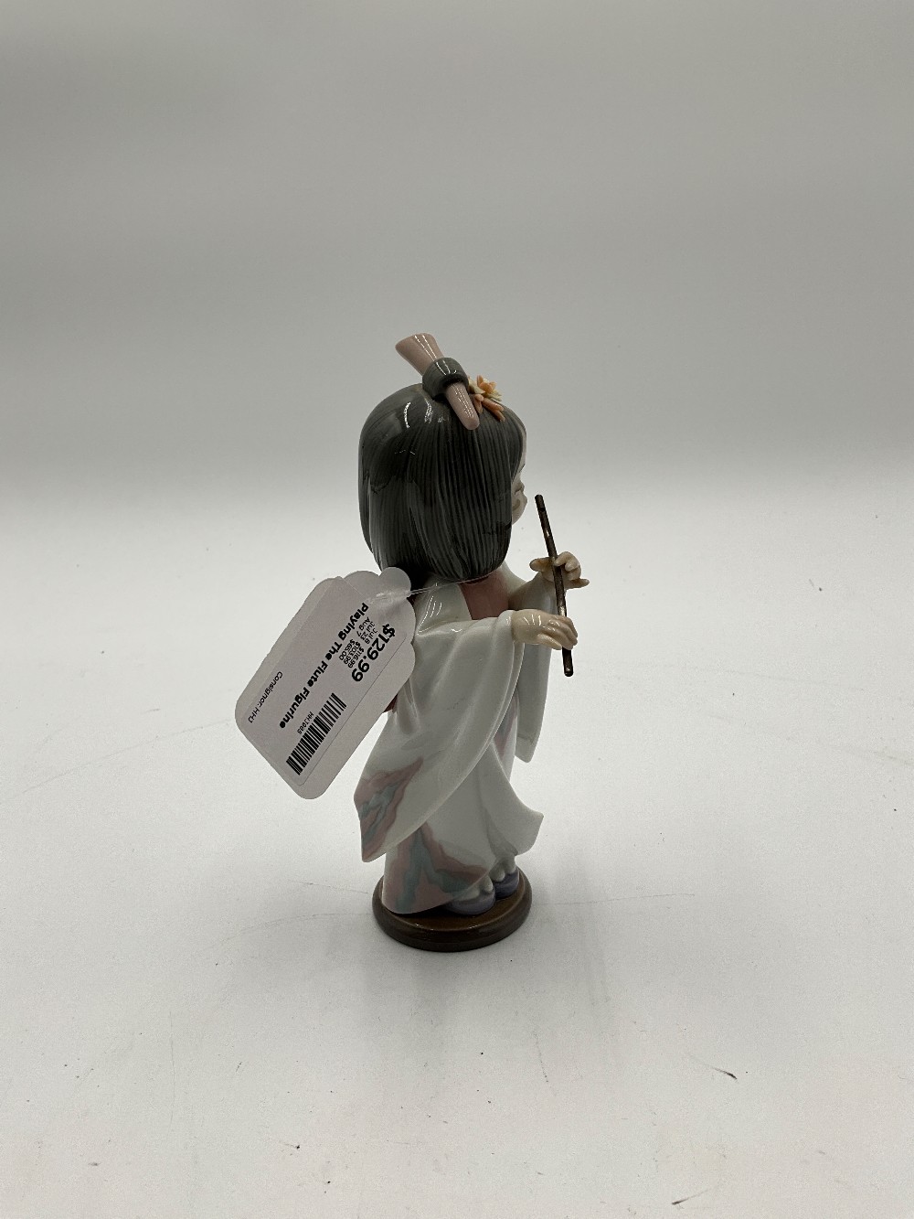 Playing The Flute Figurine