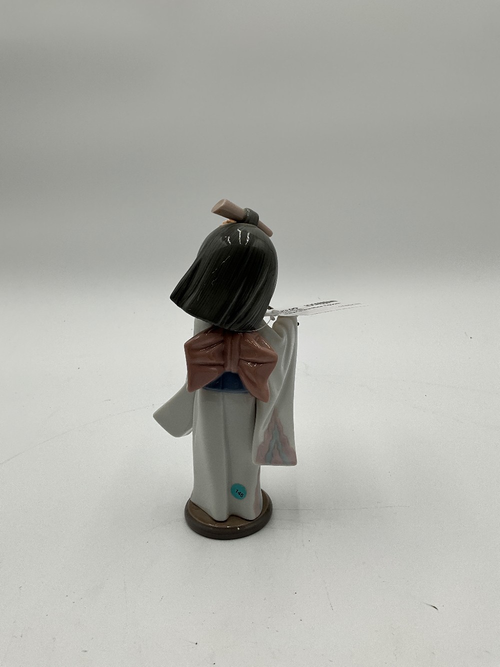 Playing The Flute Figurine