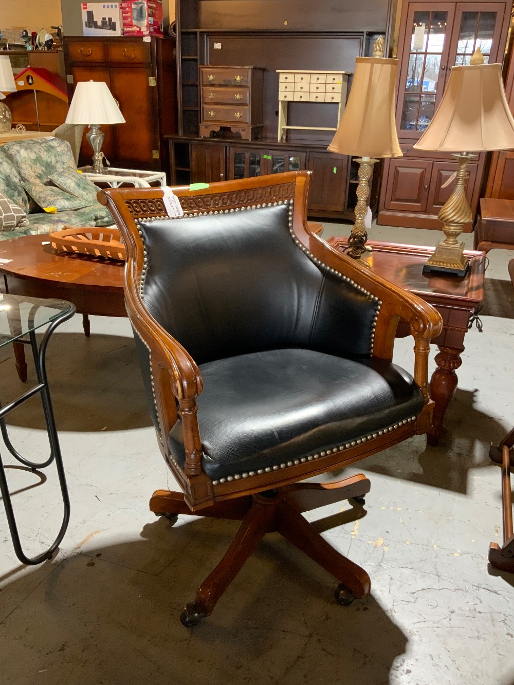 Black Upholstered Swivel Office Chair on Wheels