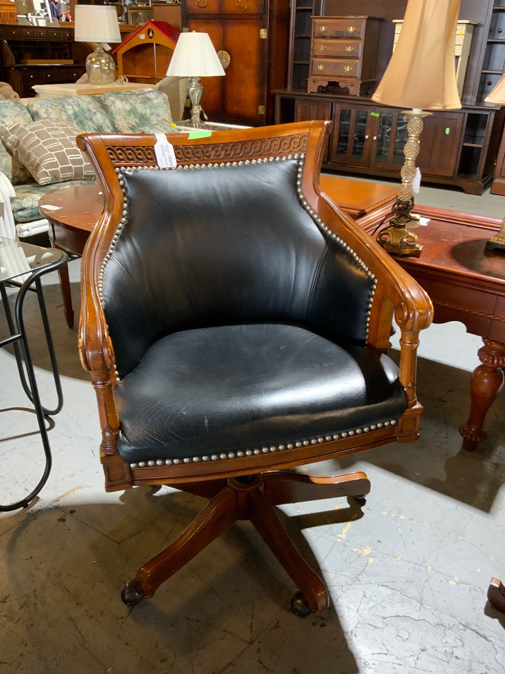 Black Upholstered Swivel Office Chair on Wheels