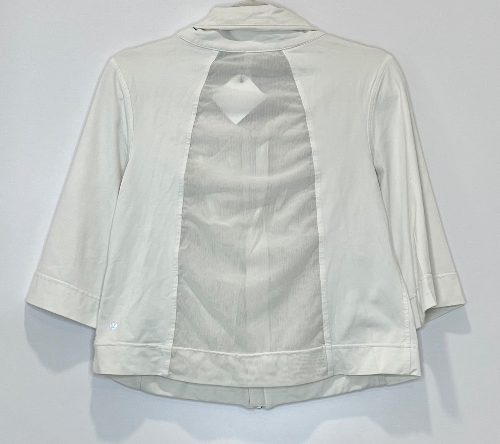 Veste LULULEMON (S) blanche (dos en résille)