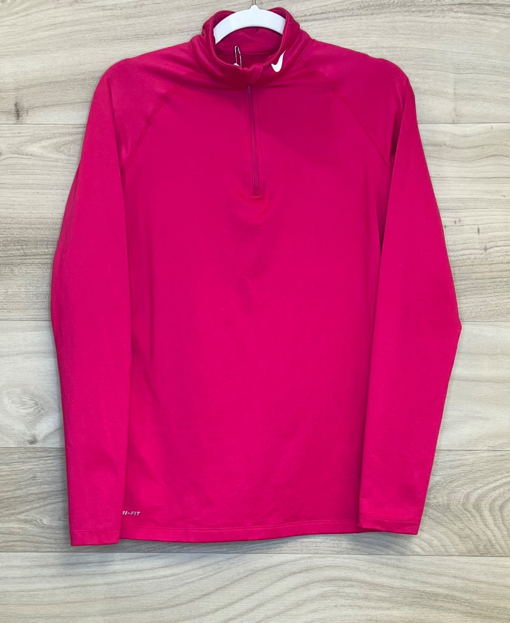 Chandail Nike (M) rose (légèrement doublé)