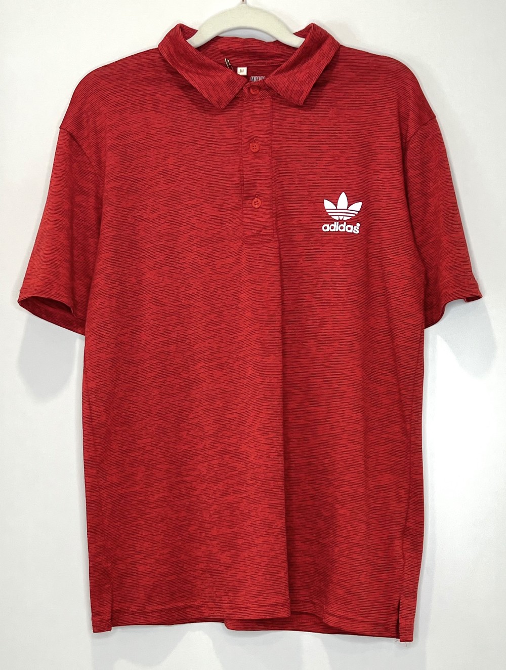 H Polo UnderArmour (M) rouge