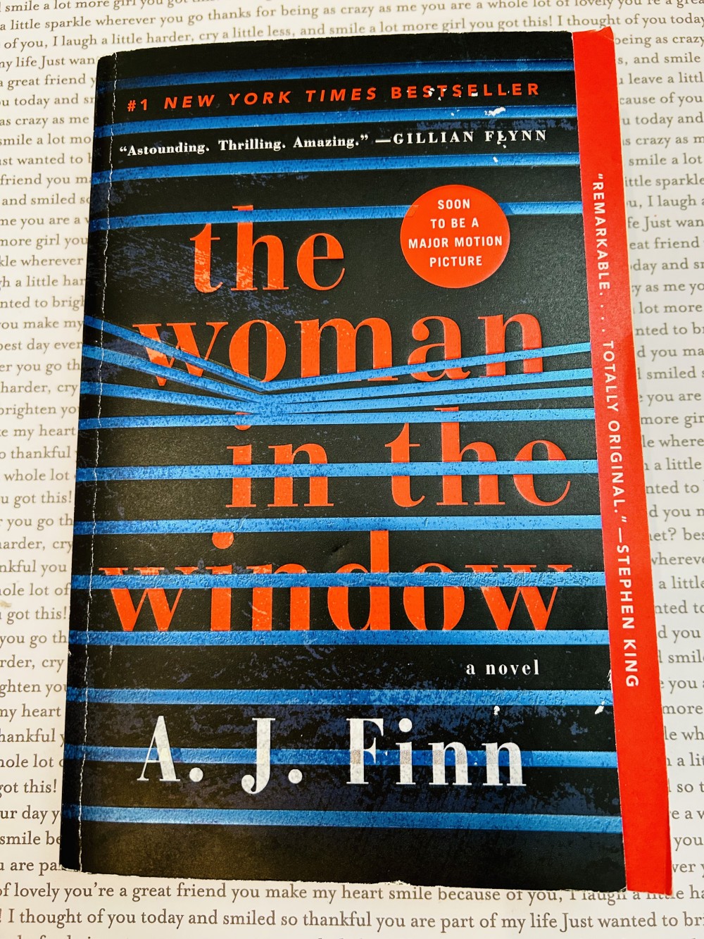 W - The Woman in the Window