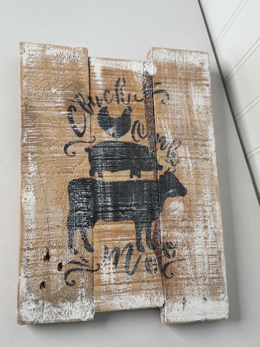 2603 -  rustic wood plank sign features a stenciled farm scene of a cow, pig, and chicken stacked together  (8.5x.5x11)