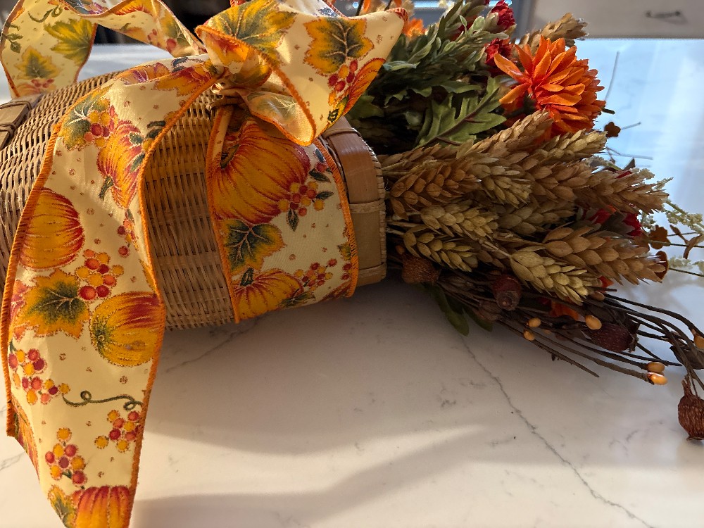 Fall floral arrangement with vintage basket