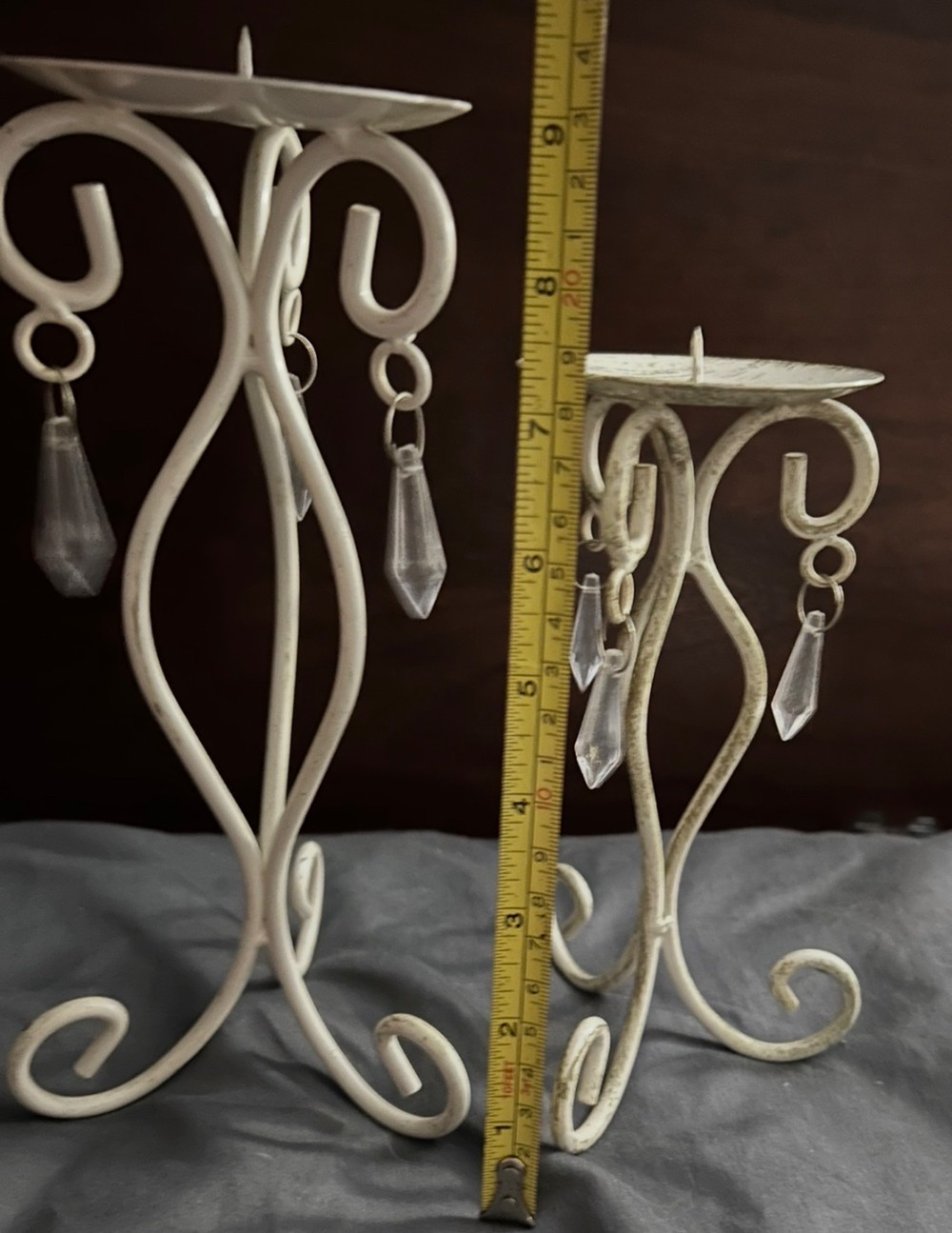A pair of Shabby chic candle holders