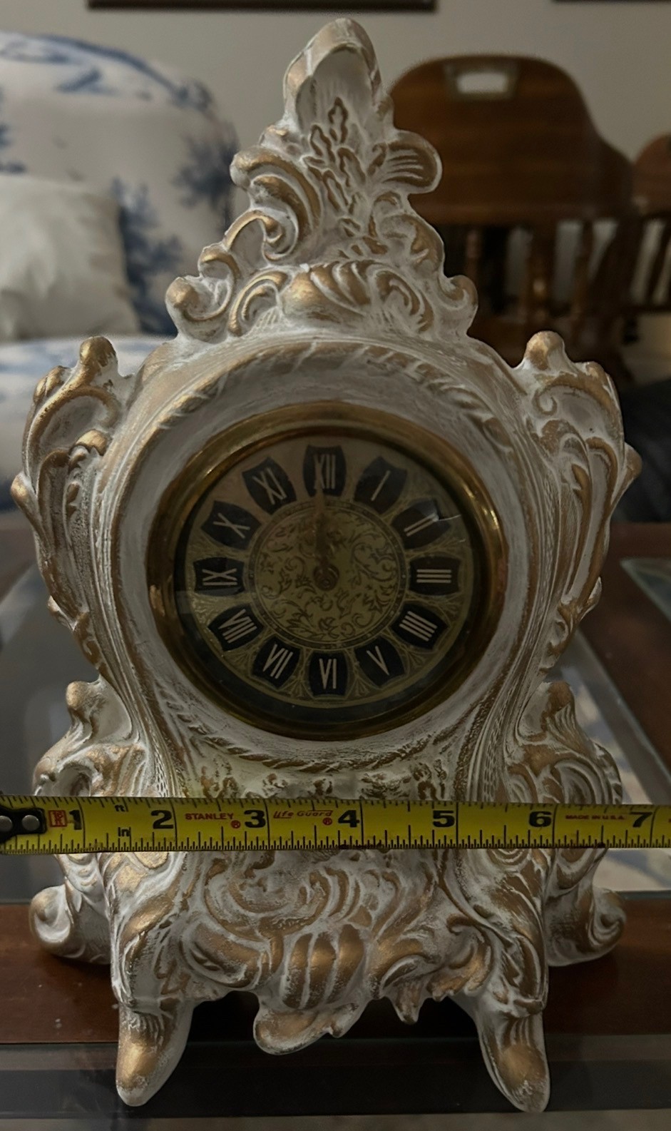 Ornate white and gold vintage clock